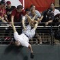 In pictures: Fan nearly falls from stands during homer derby