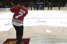 Richie McCaw pulls on a Blackhawks jersey and tries his hand at ice hockey