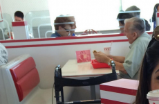 This picture of a widower dining alone with a photo of his dead wife is going viral
