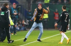 Scarf-wielding supporter run across pitch and slaps Bayern Munich's Franck Ribery