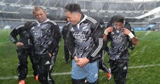 The All Blacks prepared for their game in Chicago with some American football in the snow