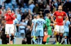 Aguero gives City spoils against 10-man United