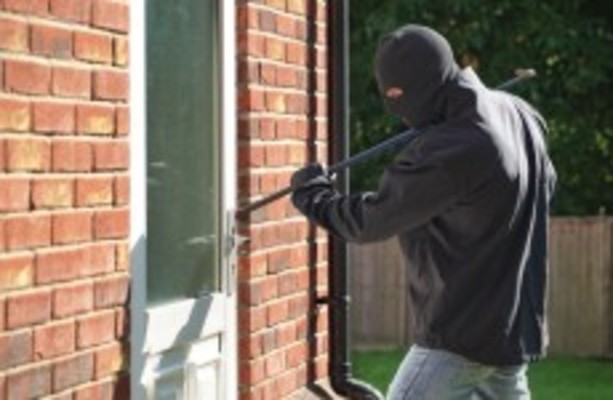 Four robbers burst into home where young children present, one woman ...