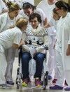 Spanish nurse cured of Ebola holds back tears as she leaves hospital