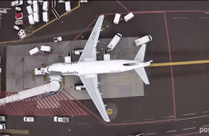 Drone footage shows what it's like to be a bird flying over an airport