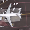 Drone footage shows what it's like to be a bird flying over an airport