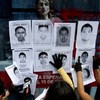 Bodies of Mexican students burned by gang in 14-hour inferno