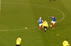 Linfield player loses both boots but still manages to set up goal