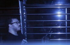 British banker accused of gruesome murder smiles as he leaves court