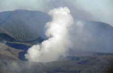 Erupting volcano forces Indonesian villagers to flee homes