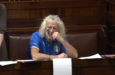 Mick Wallace is wearing an Italy soccer jersey in the Dáil this morning