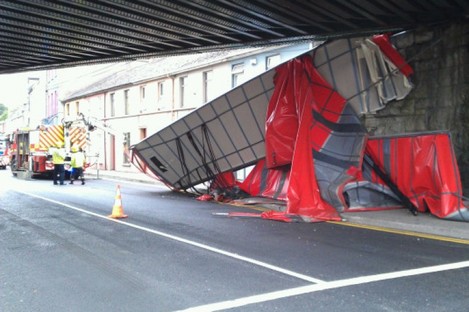 The side of the lorry remains wedged under the bridge at Lower Glanmire Road, Cork