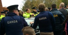 Two arrested over protest that trapped Joan Burton in her car for hours