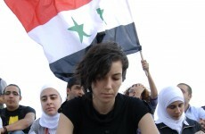 Syrian forces open fire on protesters, killing 14