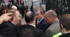 Pics: Taoiseach confronted by water charge protesters