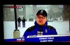 Comically obvious drug deal goes down in the background of live news report