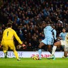 Toure rescues City again to maintain third place