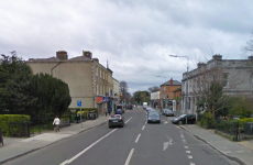 A man was robbed by another man dressed as a woman and carrying a handgun