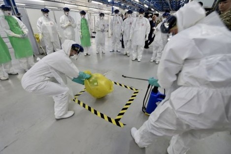 NHS staff in the UK run a training drill for combating Ebola earlier this month