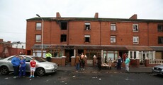 Baby thrown from window as family escape three-storey house blaze