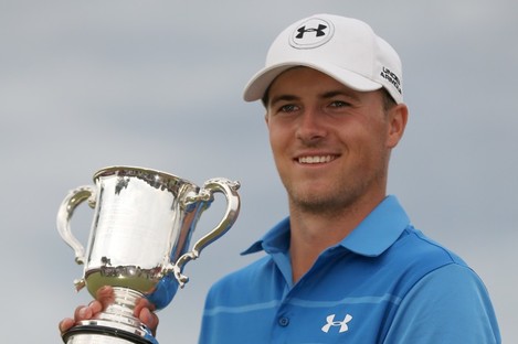 Spieth with the trophy. 