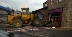Digger used to smash into off-licence