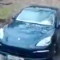 Guy attempts to drive a Porsche across a river, because why not?