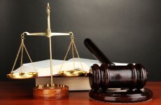 Man in his 20s charged with sexual assault of woman in her 70s