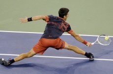 Djokovic advances despite fighting in stand
