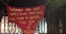 Pro-choice activists tie pair of giant red knickers to Dáil gates