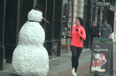 Evil snowman terrorises shoppers in cruel Christmas prank