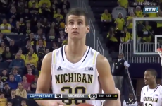 Double plane crash survivor Austin Hatch scores his first college basketball point