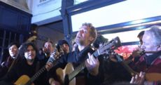 No Bono, but famous faces sing for hundreds at Christmas Eve busk on Grafton St