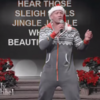 The Rock is surprisingly good at singing Christmas songs in a onesie