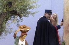 A topless woman tried to steal the Baby Jesus out of the Vatican's crib