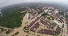 Malaysia PM under fire for playing golf with Obama while 120k flee floods