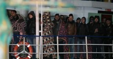 360 migrants leave 'ghost ship' stranded off Italian coast