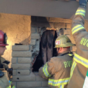 Woman rescued after getting naked and climbing down ex-boyfriend's chimney