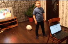 Cat can't deal with little boy's singing, so lets him know about it