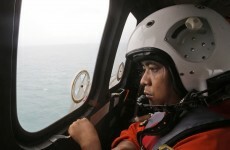 Search area expanded as divers continue recovery of AirAsia victims
