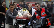 Manhunt for gunmen in Paris after twelve killed in massacre at satirical magazine offices