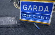 Woman dies in collision between truck and car, three people injured