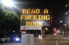 Someone hacked an LA traffic sign to say "Read a f***ing book"