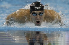 Phelps wins men's 200 butterfly at worlds