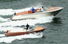 Roger Federer plays Lleyton Hewitt from moving speed boat at Sydney Harbour