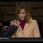 News reporter shoves make-up artist out of the way live on air