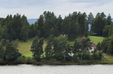 Norway massacre gunman 'surrendered with his hands up'