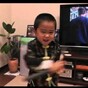 This little kid can almost perfectly imitate Bruce Lee's nunchaku moves