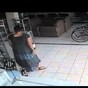 Watch this stealthy woman steal a TV by shoving it up her dress