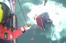Dramatic video shows fishermen saved moments before their boat sank